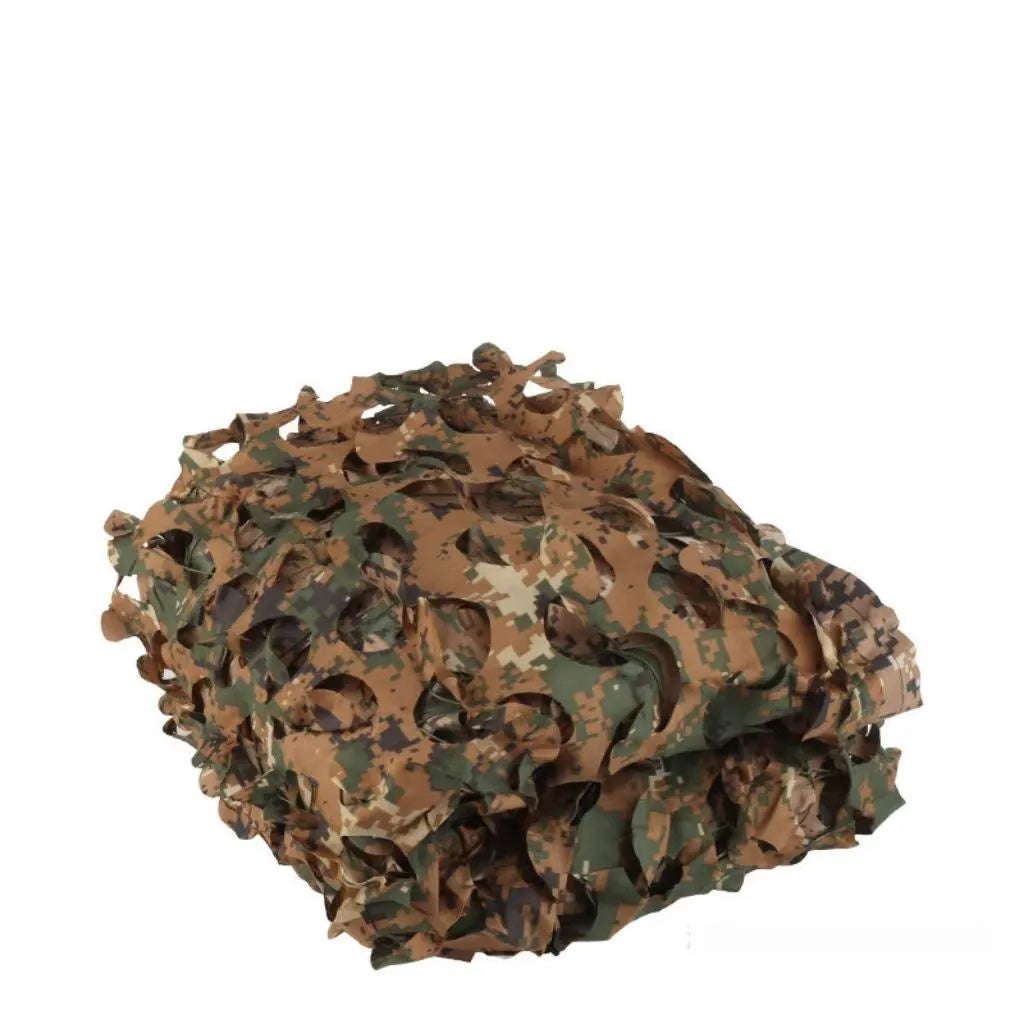 Green camouflage netting set on grass showing textured pattern for sunshade and concealment.