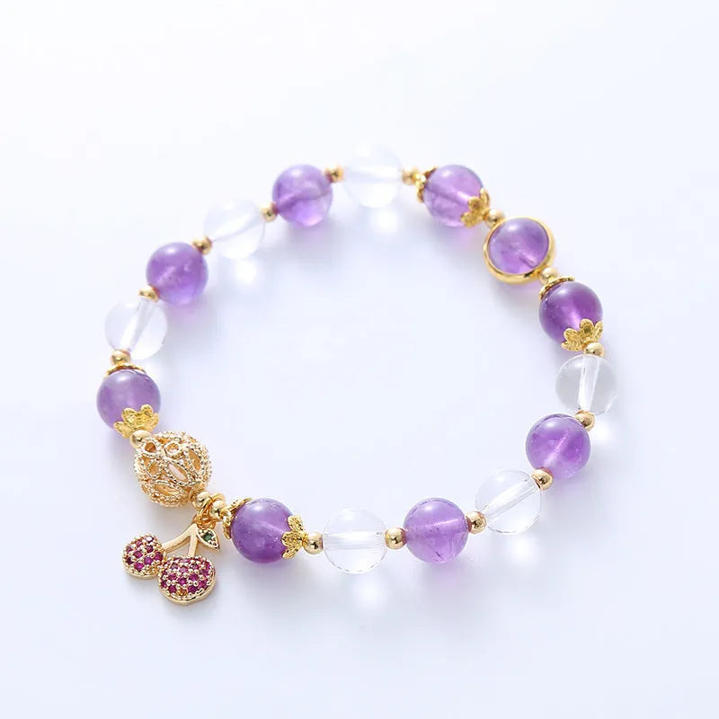 Purple crystal women's bracelet with micro-inlaid cherry blossom design in amethyst colour tones.