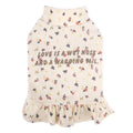 Light purple floral undershirt on a small bichon dog, showing the skirt style and fit.