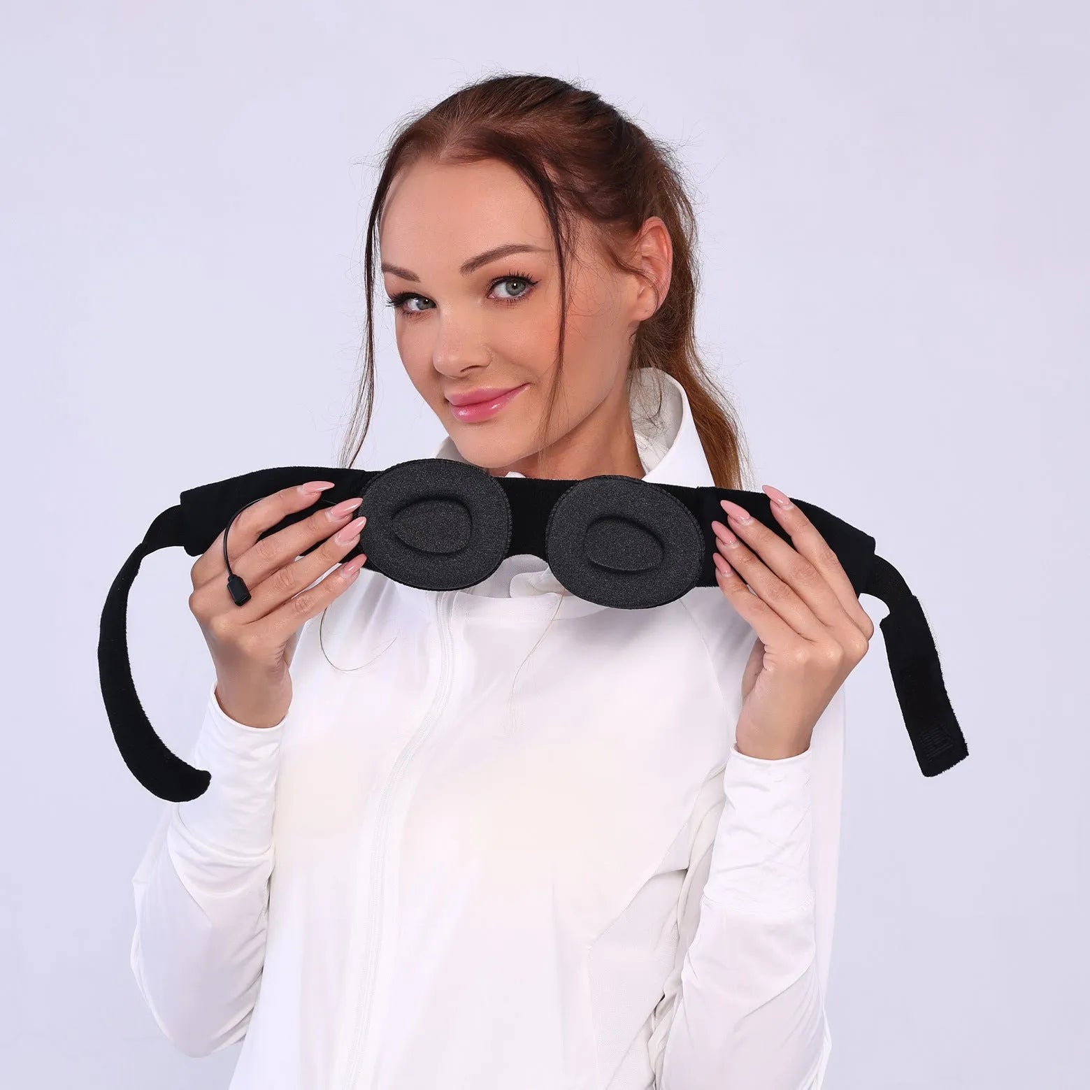 Grey outline Bluetooth sleeping eye mask with integrated speakers for pressure-free eyelash protection