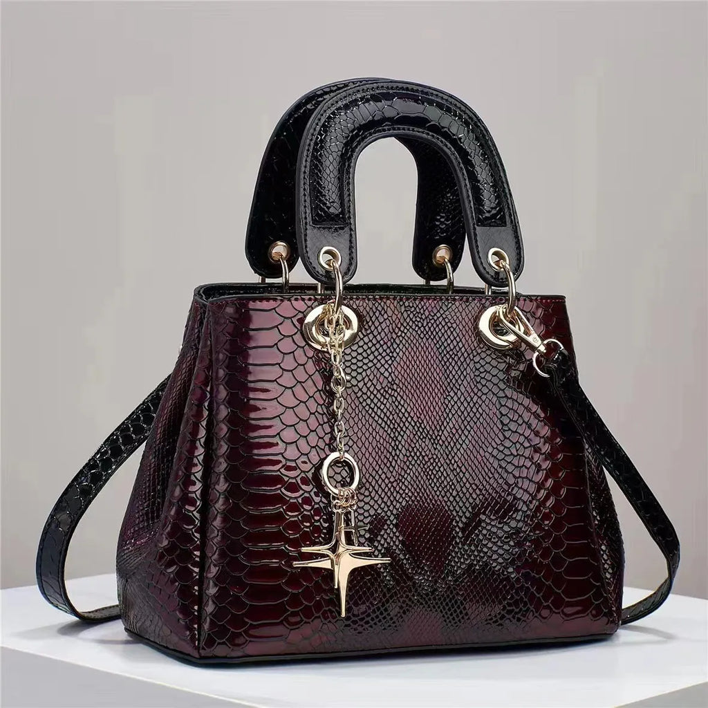 Women's PU shoulder messenger bag with crocodile pattern, zip closure, hidden pocket, 26x12x18cm, in black, green, red or silver.