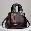 Women's PU shoulder messenger bag with crocodile pattern, zip closure, hidden pocket, 26x12x18cm, in black, green, red or silver.