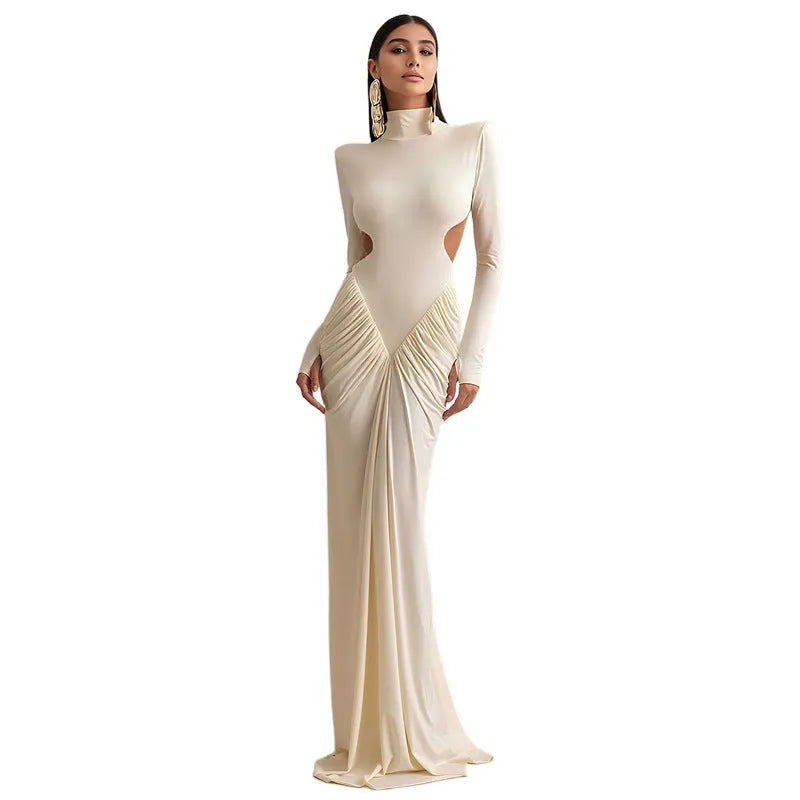 A woman's long sleeve high collar slim fit pleated backless formal dress in a solid colour.