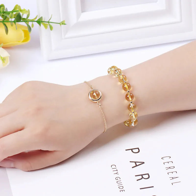 Double-layer women's bracelet with crystal beads and lucky charms in gold electroplated finish