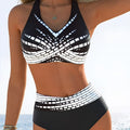 Women's two-piece swimsuit with halter high chest top, briefs-style bottoms, and matching shorts in contrast colour
