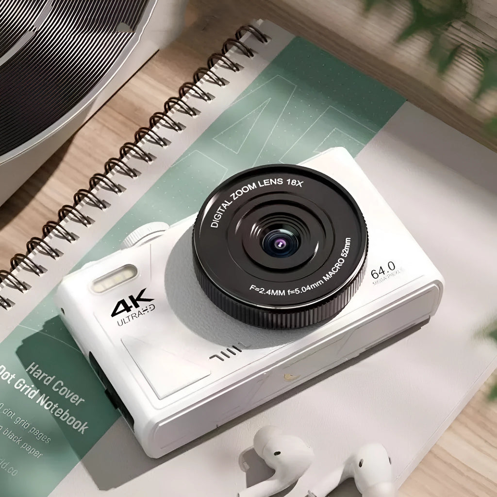 64 million HD mirrorless CCD camera with ABS body, black, front view showing lens and full HD screen