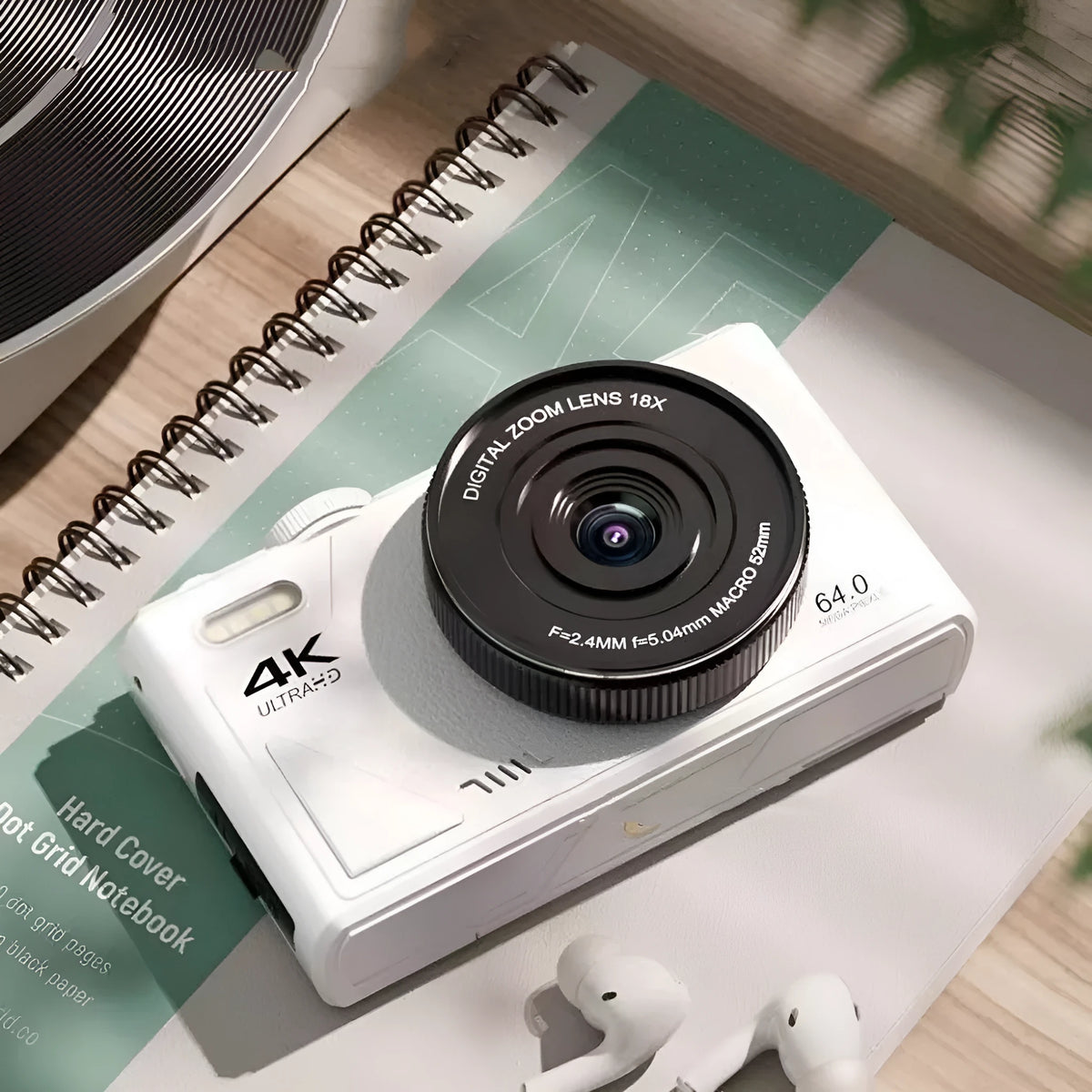 64 million HD mirrorless CCD camera with ABS body, black, front view showing lens and full HD screen