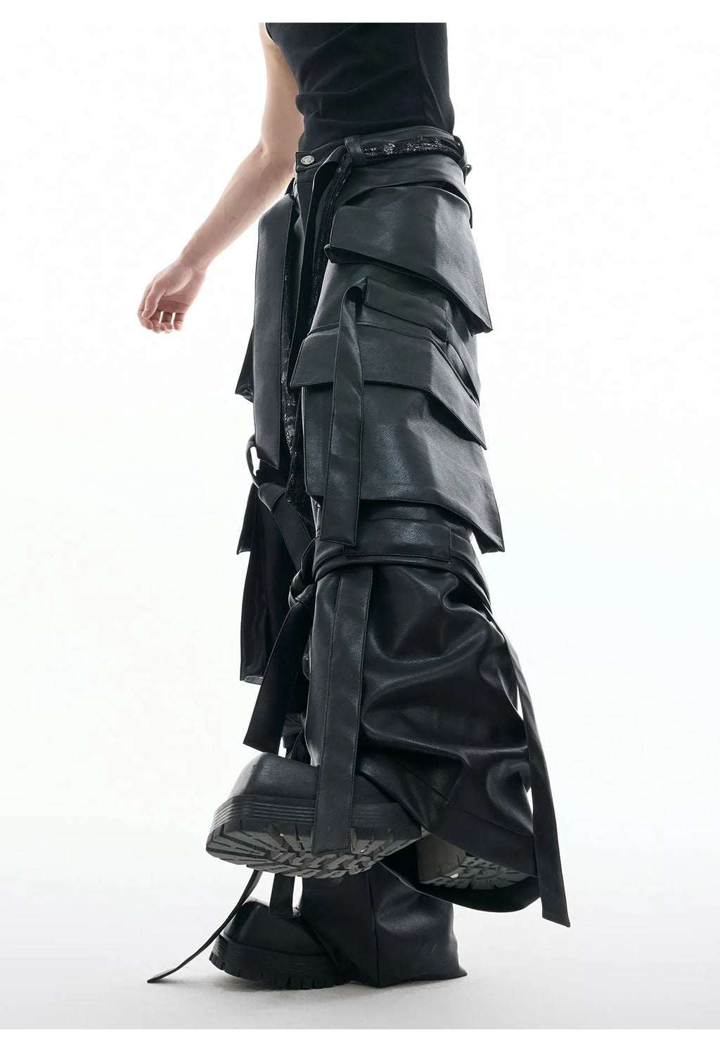 Black loose-fit men's cargo trousers with quilted panels, ribbon trim, and multiple pockets.