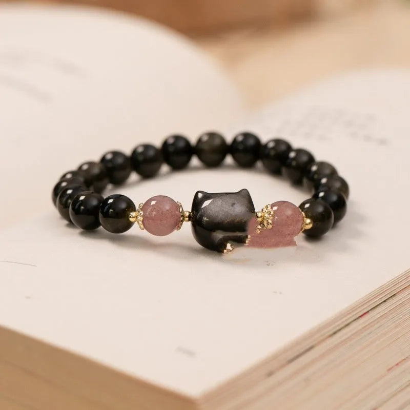 Black 8mm natural obsidian bead bracelet with silver kitty charm on elastic band