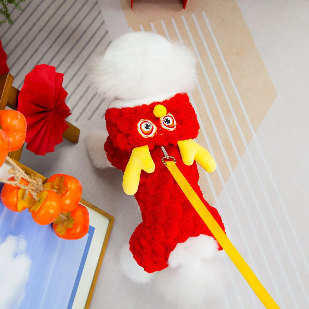 Red double-sided velvet pet jacket with a cartoon Little Dragon design for dogs and cats.