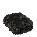 Green camouflage net set on grass showing textured pattern for sunshade and concealment.
