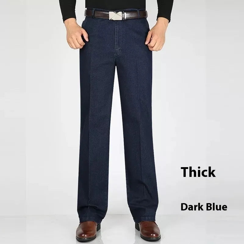 Men's high-waist loose fit blue denim trousers on a hanger, showing the casual cut and zipper fly.