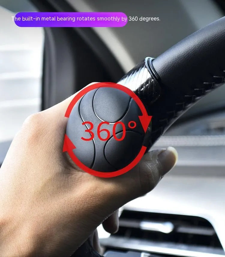 Steering wheel assist ball with silicone grip and metal bearing booster for single-handed steering