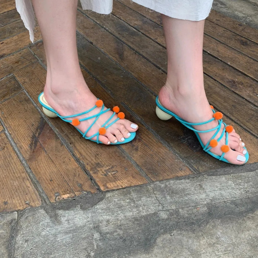 Cyan-coloured women's lace-up heeled sandals with thin straps and open toe design