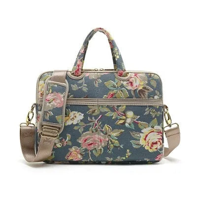 Canvas laptop sleeve with printed pattern for 13-15 inch notebooks, plush lining, and padded shoulder strap
