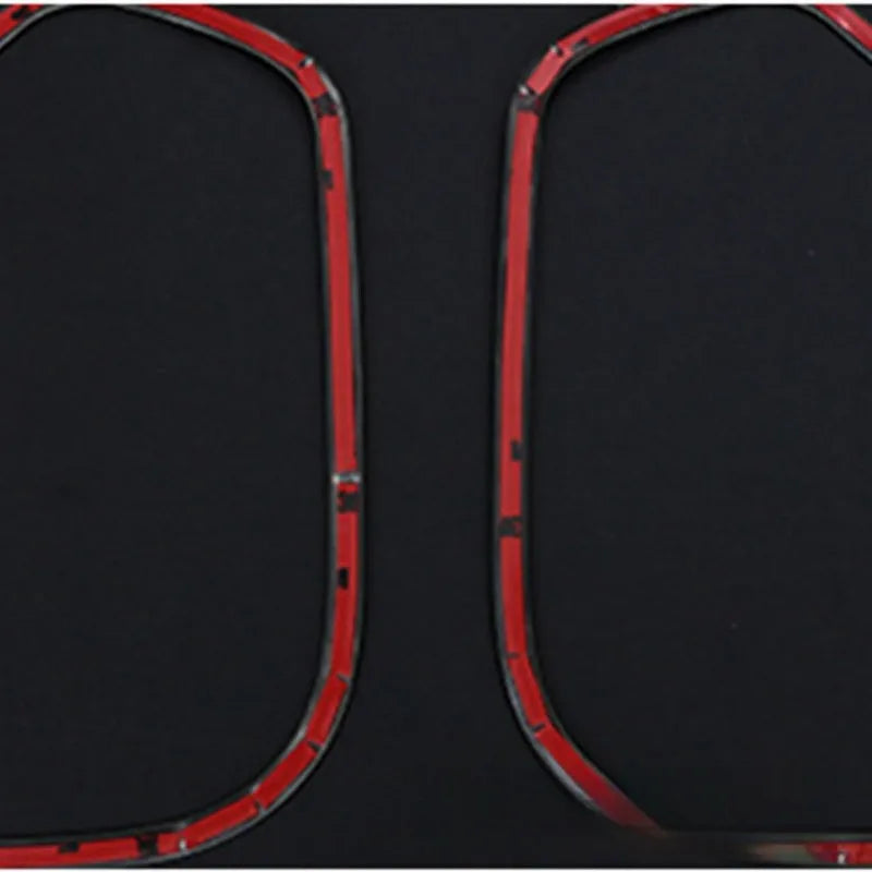 Two silver stainless steel door audio frame trim pieces for ROOX40 series vehicles