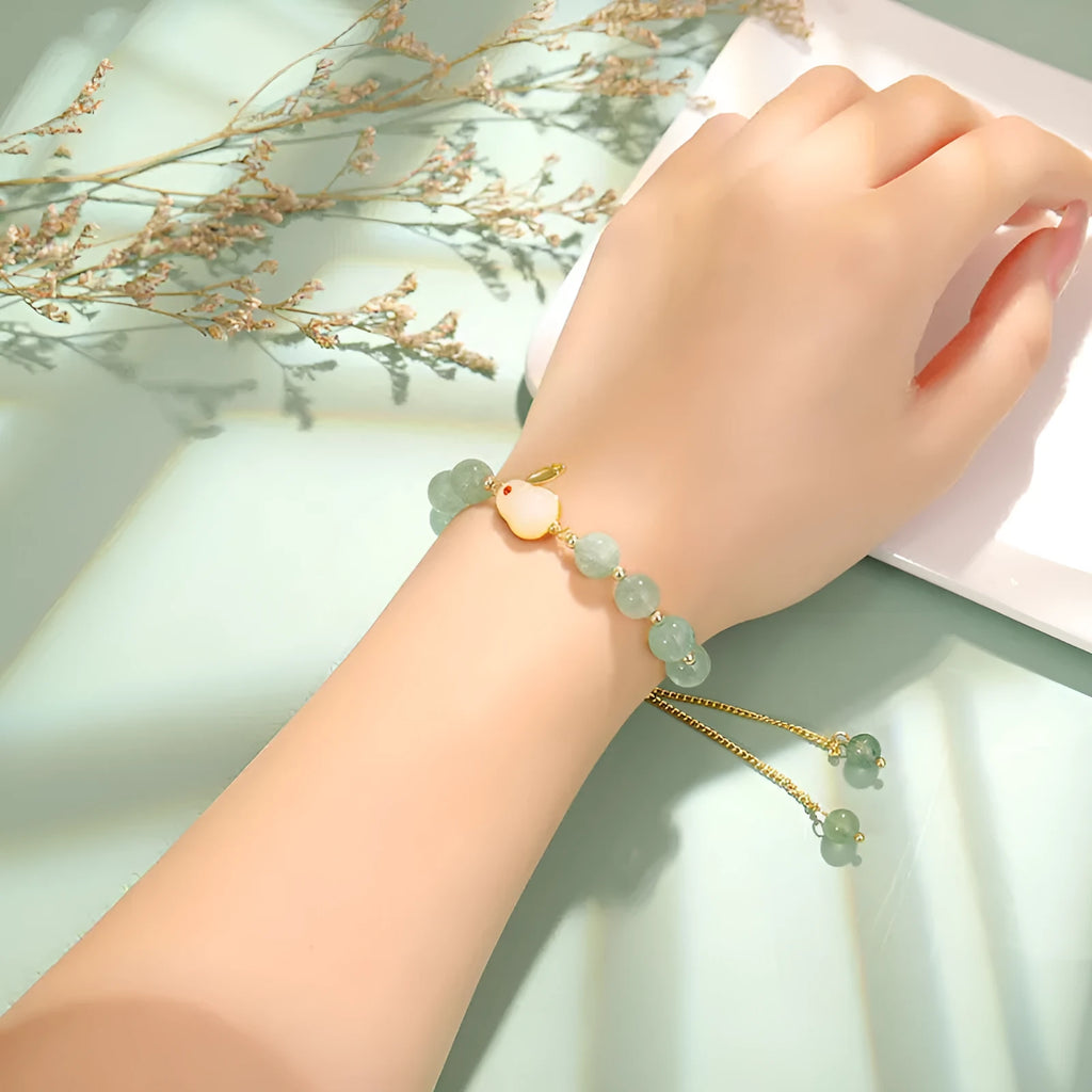 Adjustable rabbit charm bracelet with green aventurine or strawberry quartz stone beads and gold accents