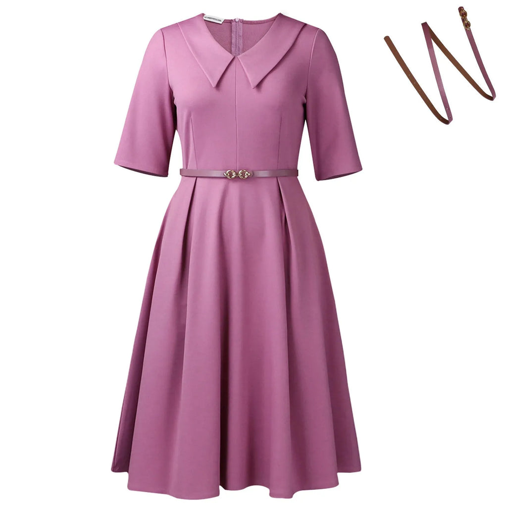 Women's solid colour African dress with half sleeves and a matching detachable belt.