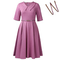 Women's solid colour African dress with half sleeves and a matching detachable belt.