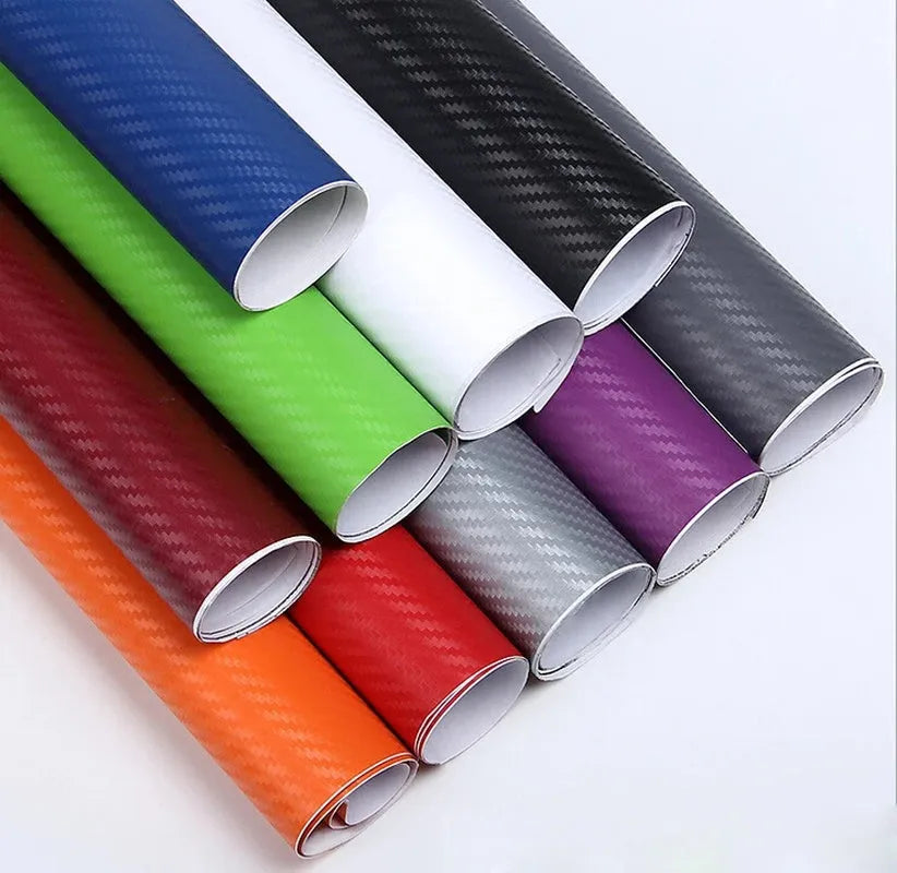Roll of carbon fibre pattern vinyl sticker measuring 30cm wide, showing colour options for car decoration.