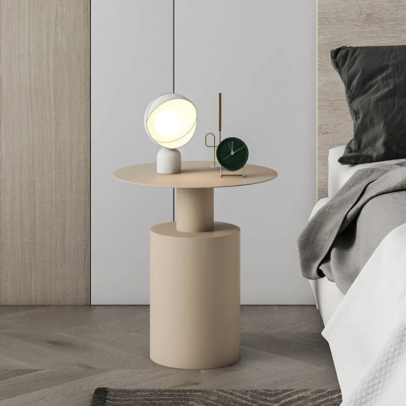 Nordic round metal bedside table in beige finish with simple modern design