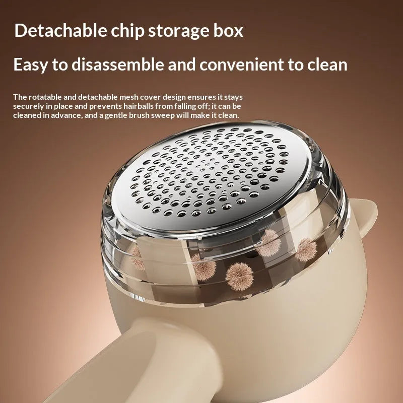 Small cat portable rechargeable lint remover in cream colour on fabric surface