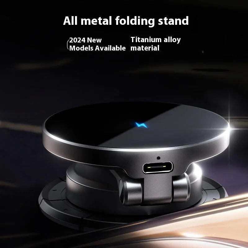 Black zinc alloy wireless charging car phone mount attached to a windscreen