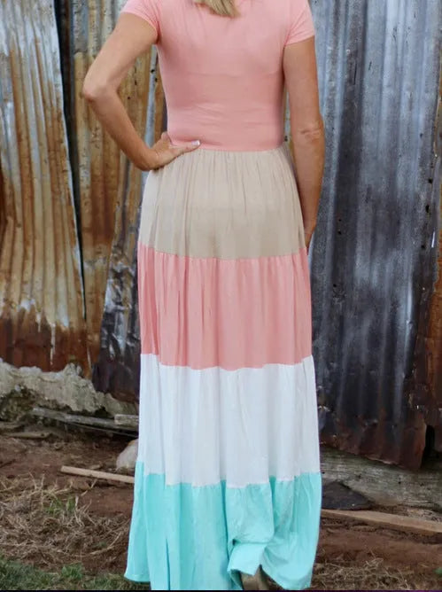 Short-sleeved pink parent-child dress with large swing skirt and round neck on a woman and child