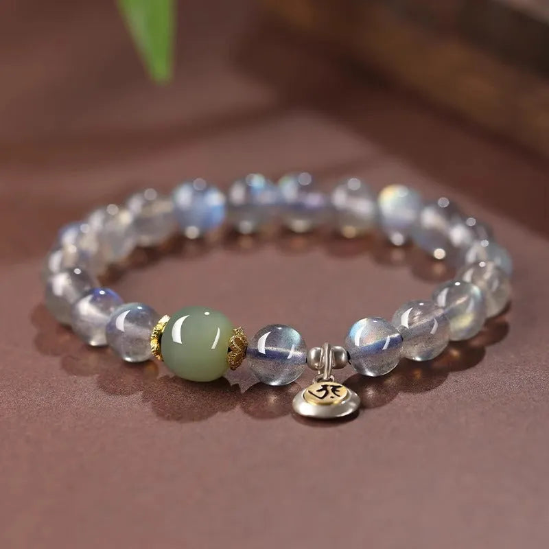 Moonstone women's bracelet with 8mm beads showing Thousand-Hand Guanyin Mouse zodiac design
