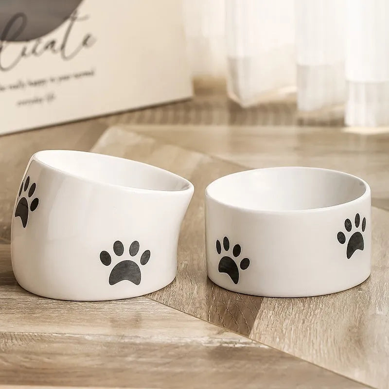 Ceramic cat bowl with high-footed design showing cat's paw decoration pattern in selected colour