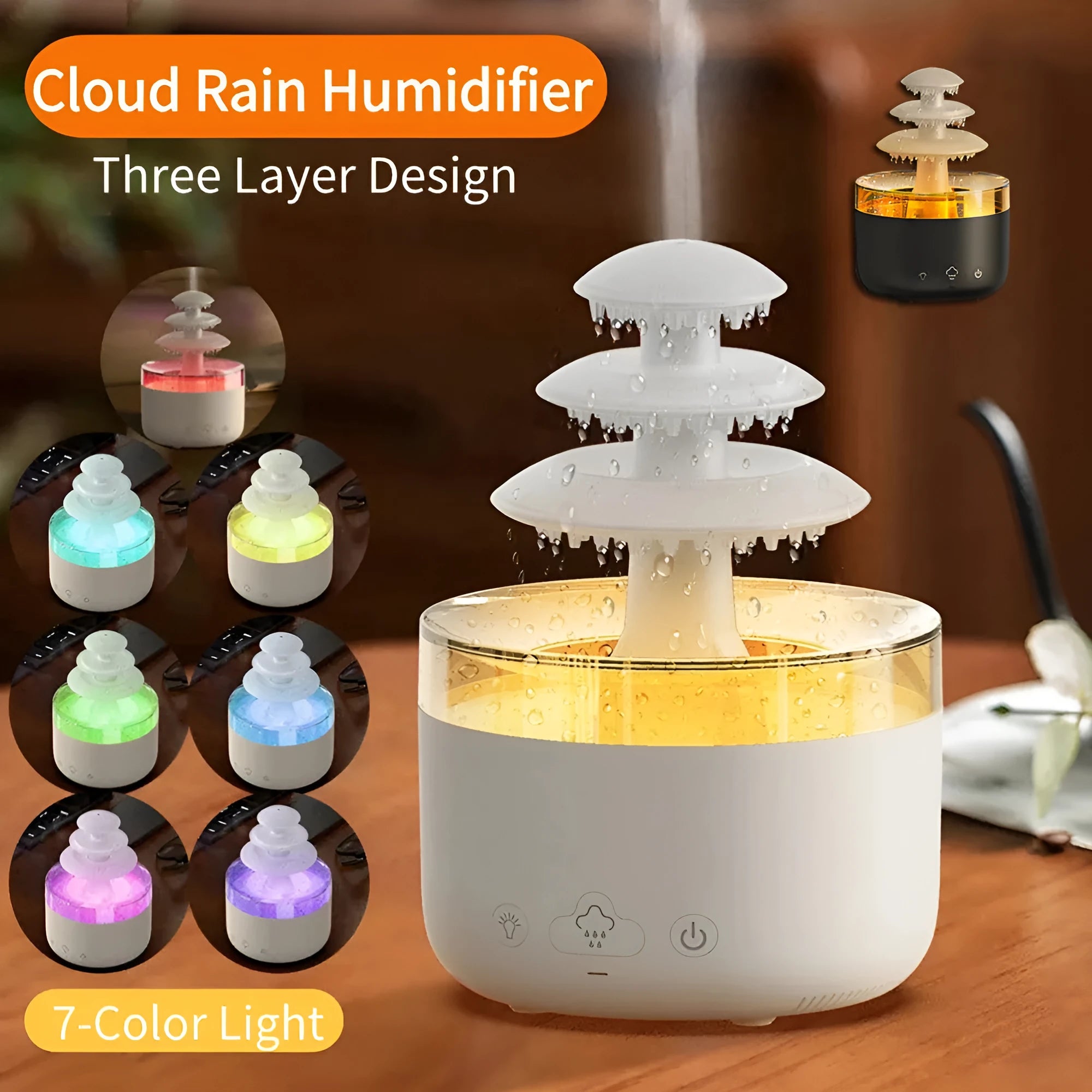 White cloud rain design ultrasonic air humidifier and essential oil diffuser with colourful LED lights on a table.