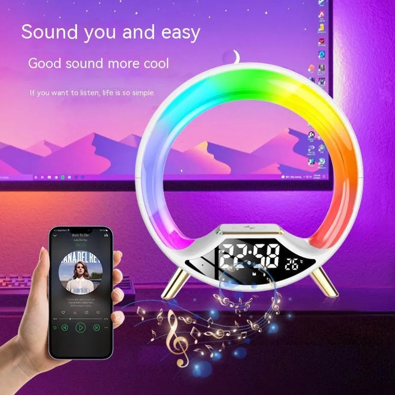LED Colourful Music Atmosphere Clock in black, a wireless charging night light with Bluetooth speaker and digital display.