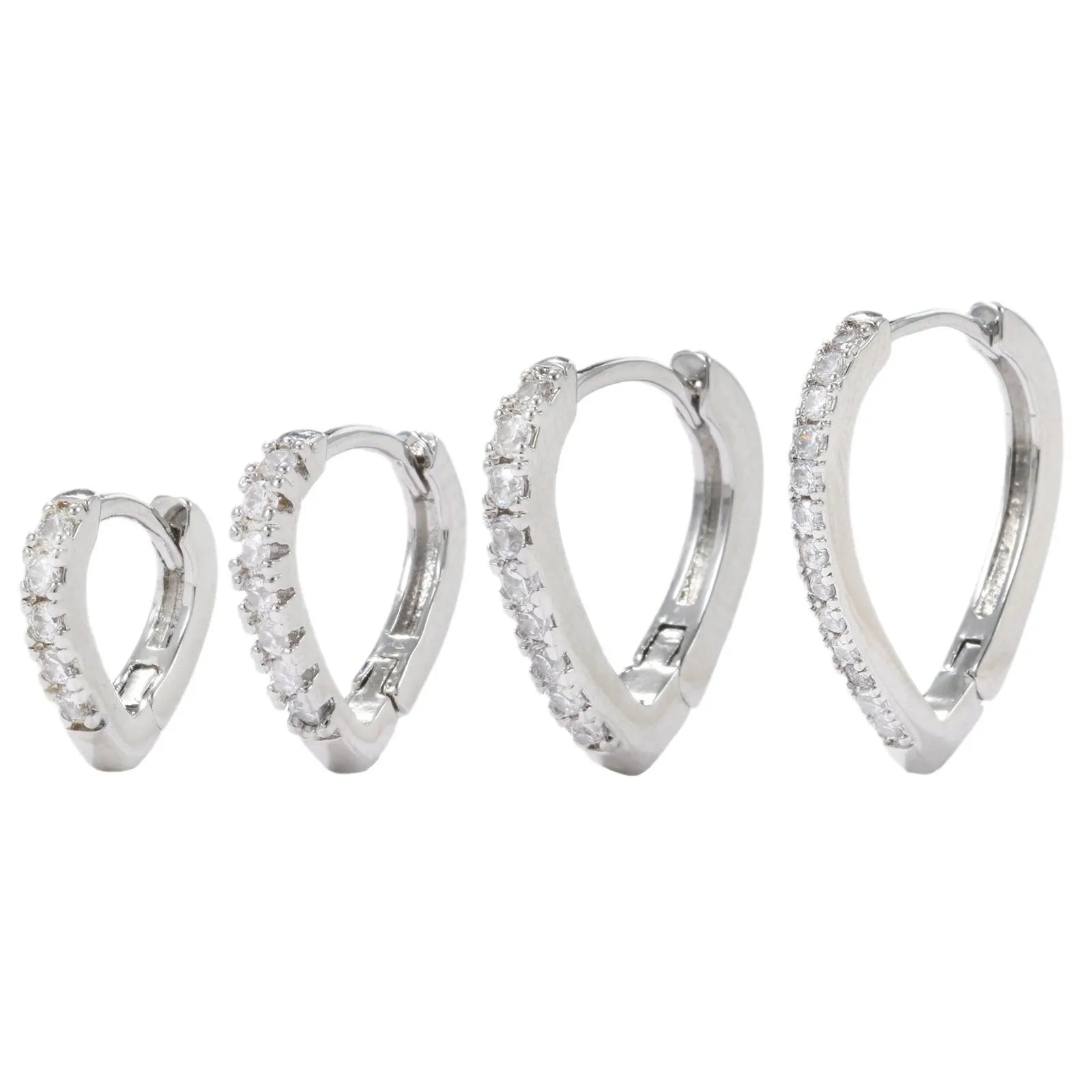 Geometrical heart-shaped gold and white gold electroplated copper ear clip for women.
