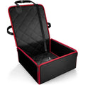 Large black dog car seat pad with non-slip base on a car front seat