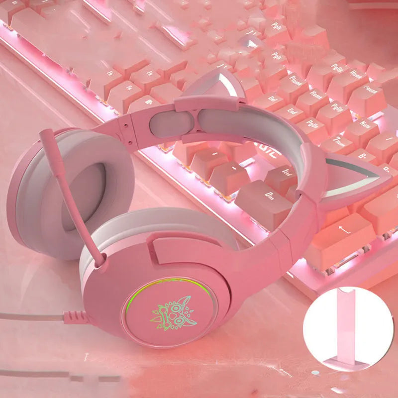 Pink cat ear wired headphones with microphone and LED lights on a stand