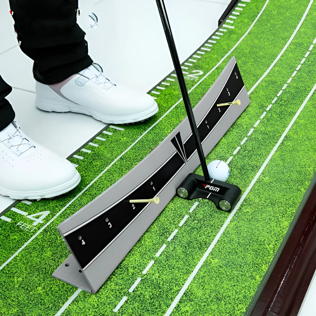 Golf putter with attached adjustable balance simulator showing the extended push rod mechanism on a putting mat.
