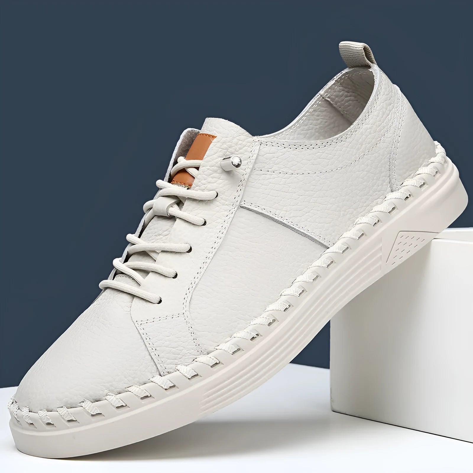 Men's beige cowhide casual sneakers with round toe and stitching details