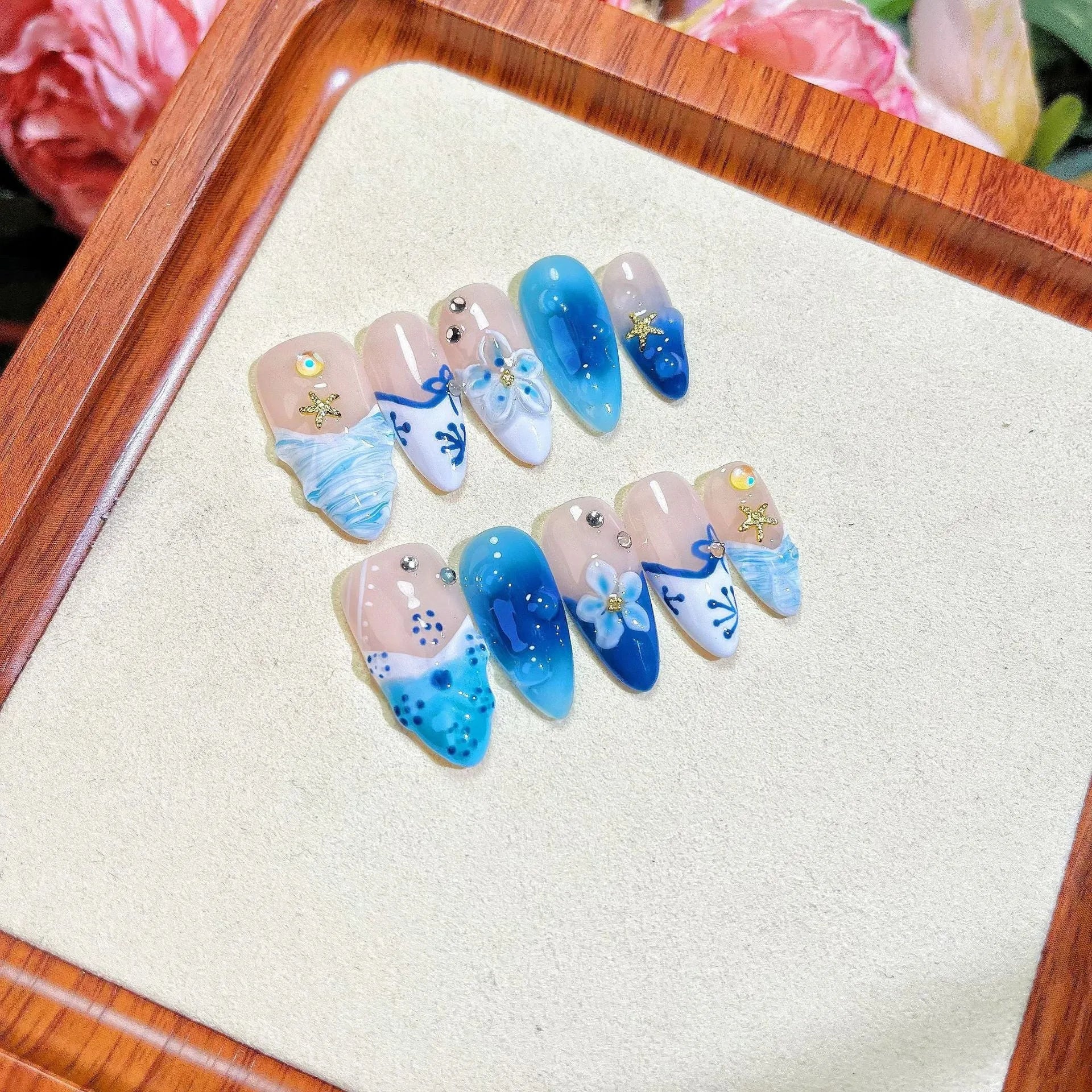 Blue hand-painted carved summer ice transparent plastic fake nails set with decorative surface detailing