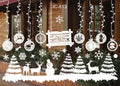 Roll of Christmas window stickers in PVC, white, with two sheets and a 50cm x 35.3cm unfolded layout.