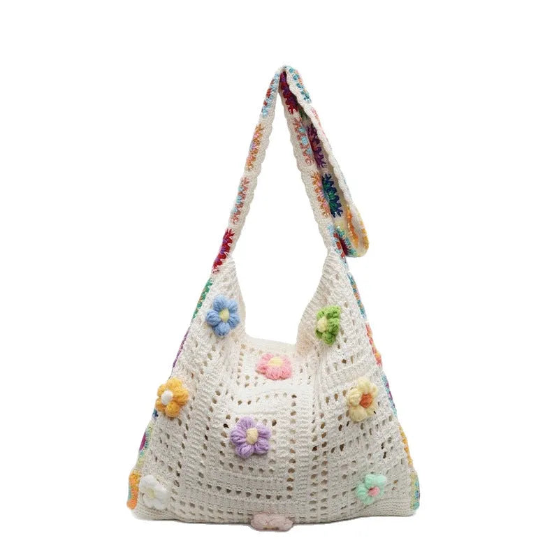 Women's large woven hollow beach shoulder bag in khaki colour showing texture and strap