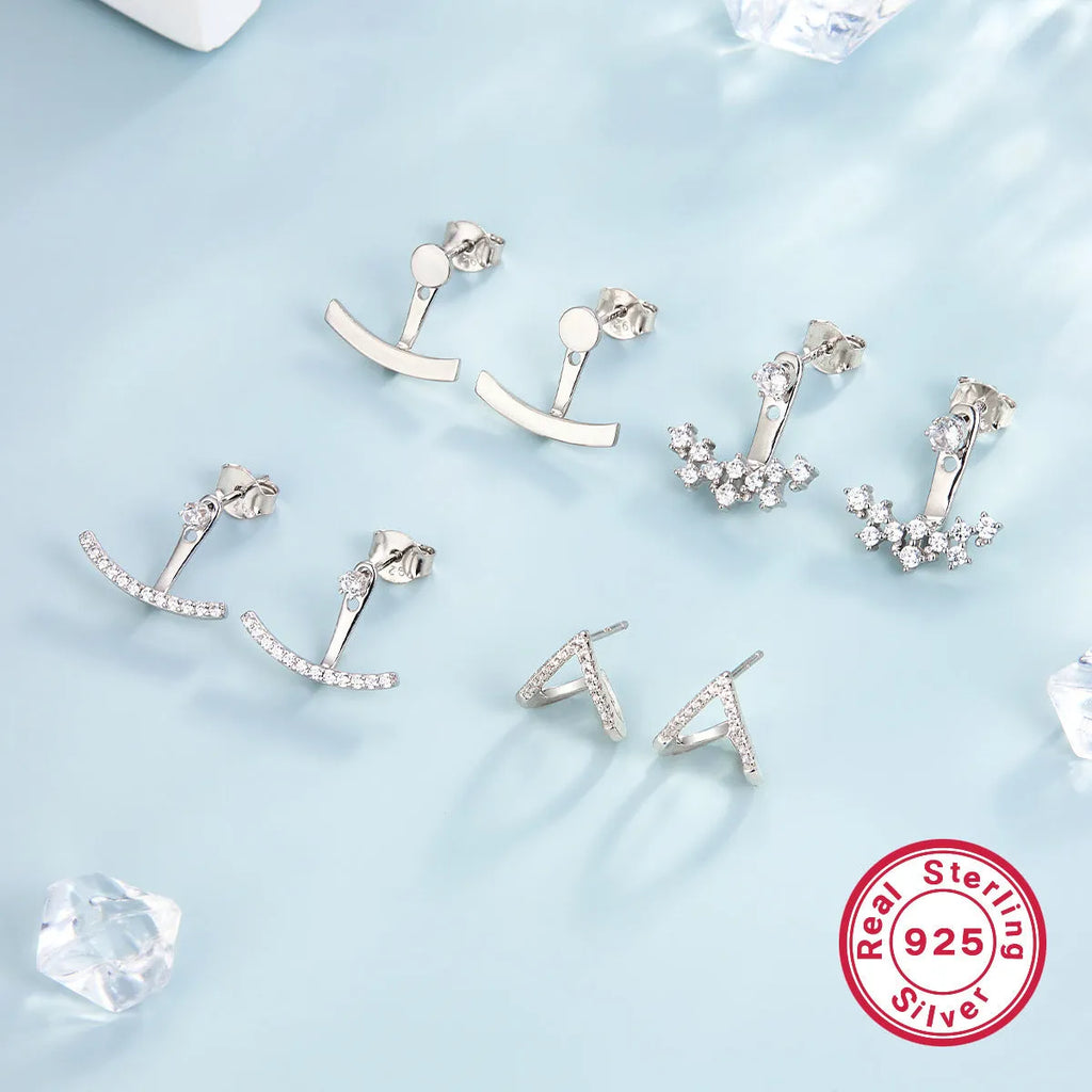 925 silver smile earrings with French diamond-embedded continuous stone setting, geometric U-shape, on a light background