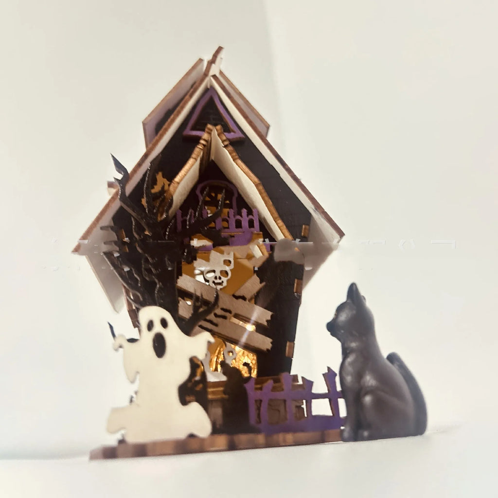 Wooden DIY glowing haunted house Halloween table decoration with luminous details