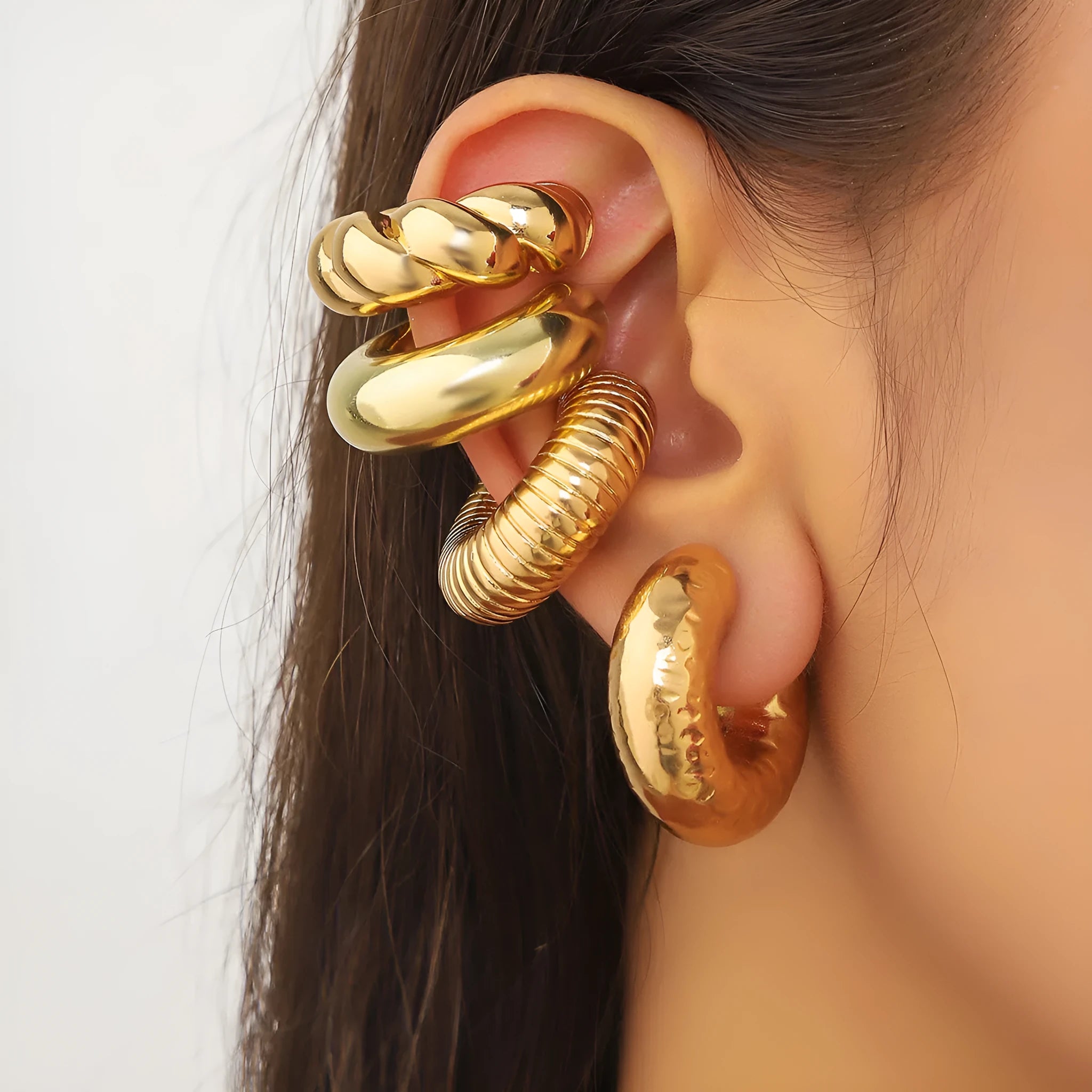 Geometric ear clips set in gold and silver colours for women without pierced ears