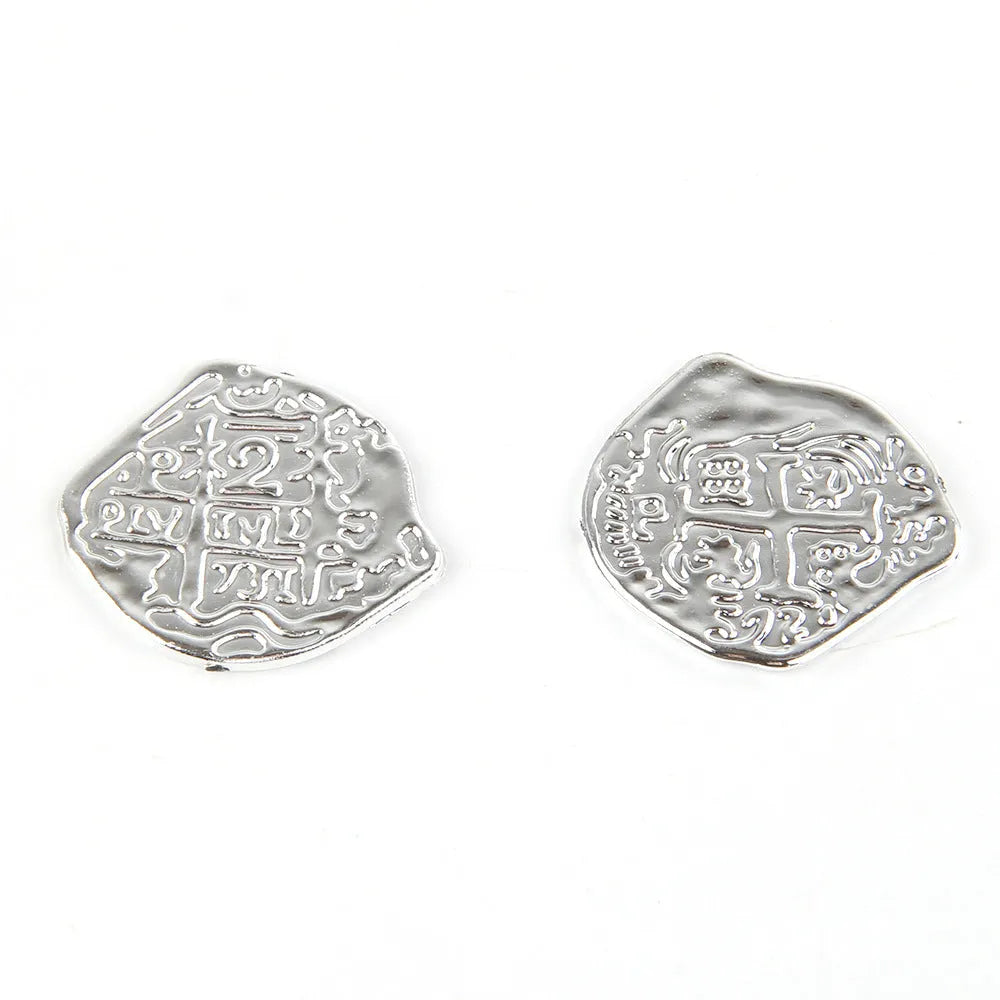 Plastic Roman coin replicas with electroplated gold, silver and bronze metallic finishes