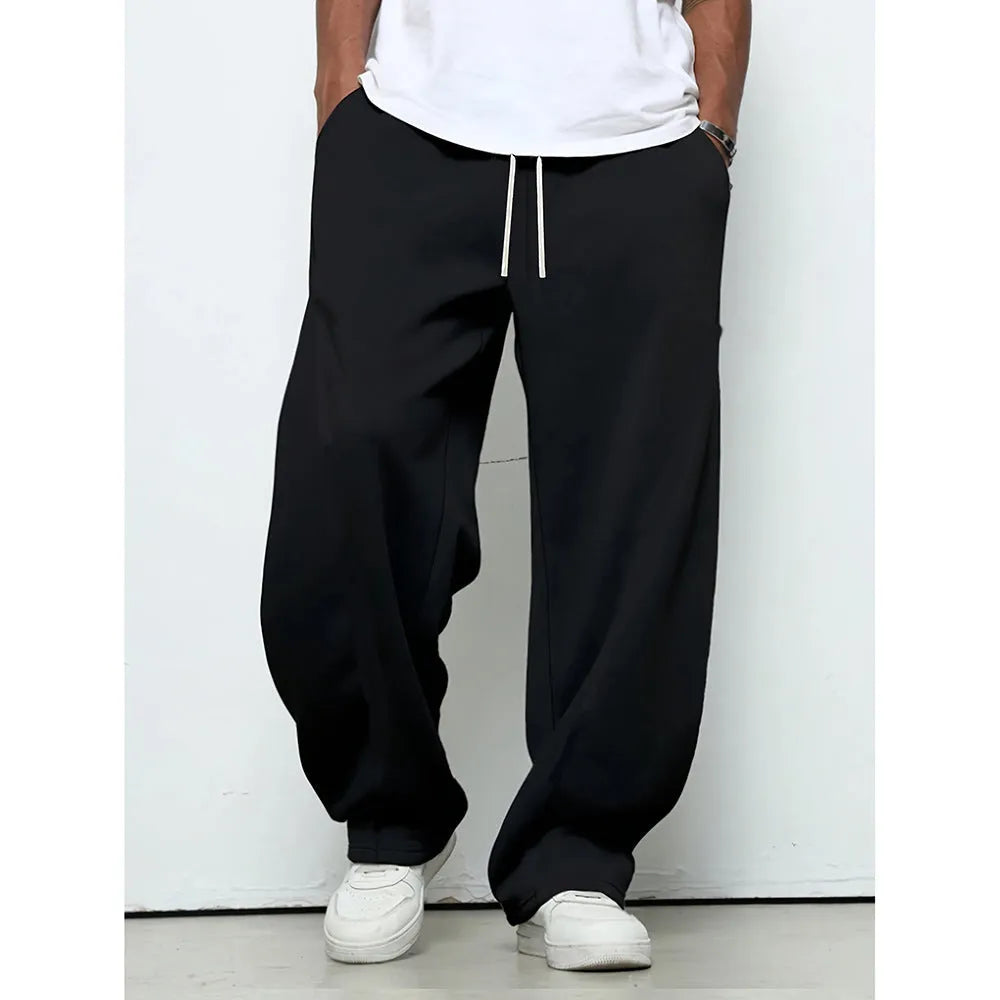 Men's straight-leg casual trousers in dark grey with a drawstring waistband.