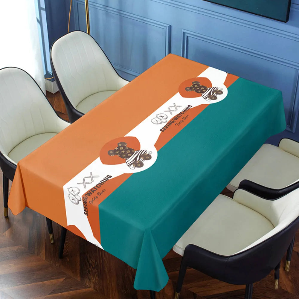 Rectangular PVC tablecloth with non-slip backing on a coffee table, showing geometric pattern