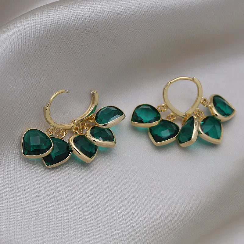 Green heart-shaped Korean style ear clip earrings with glass and artificial gemstone detailing