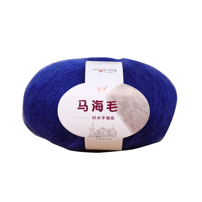 Single 100g ball of mohair yarn for a DIY hand-woven scarf kit, showing the fluffy texture.