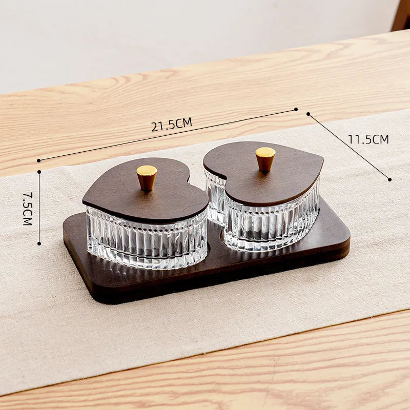 Glass snack plate with heart-shaped lids on a multi-grid tray in a retro style.