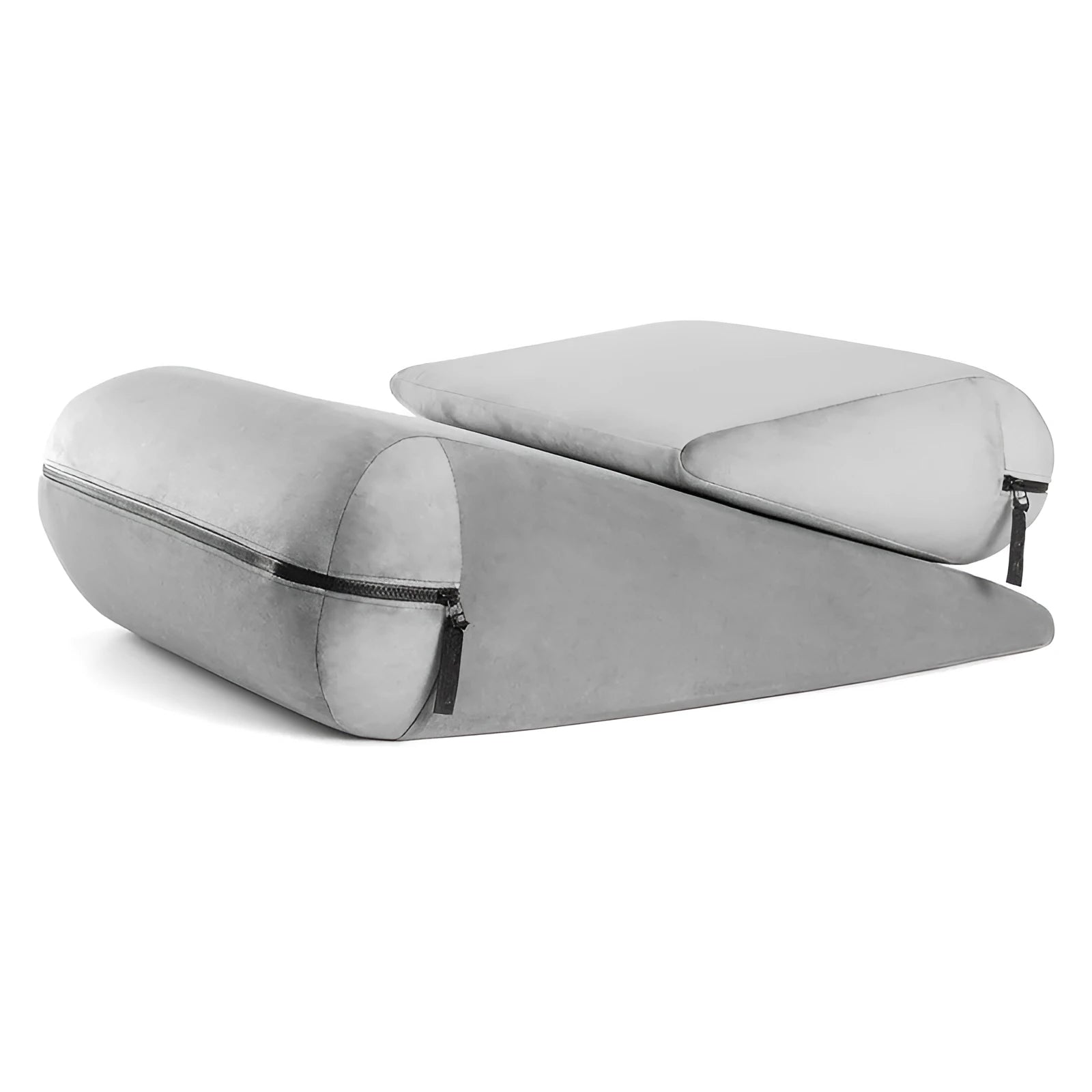 Grey triangular high-density support cushion with embroidery, shown on a sofa for scale.